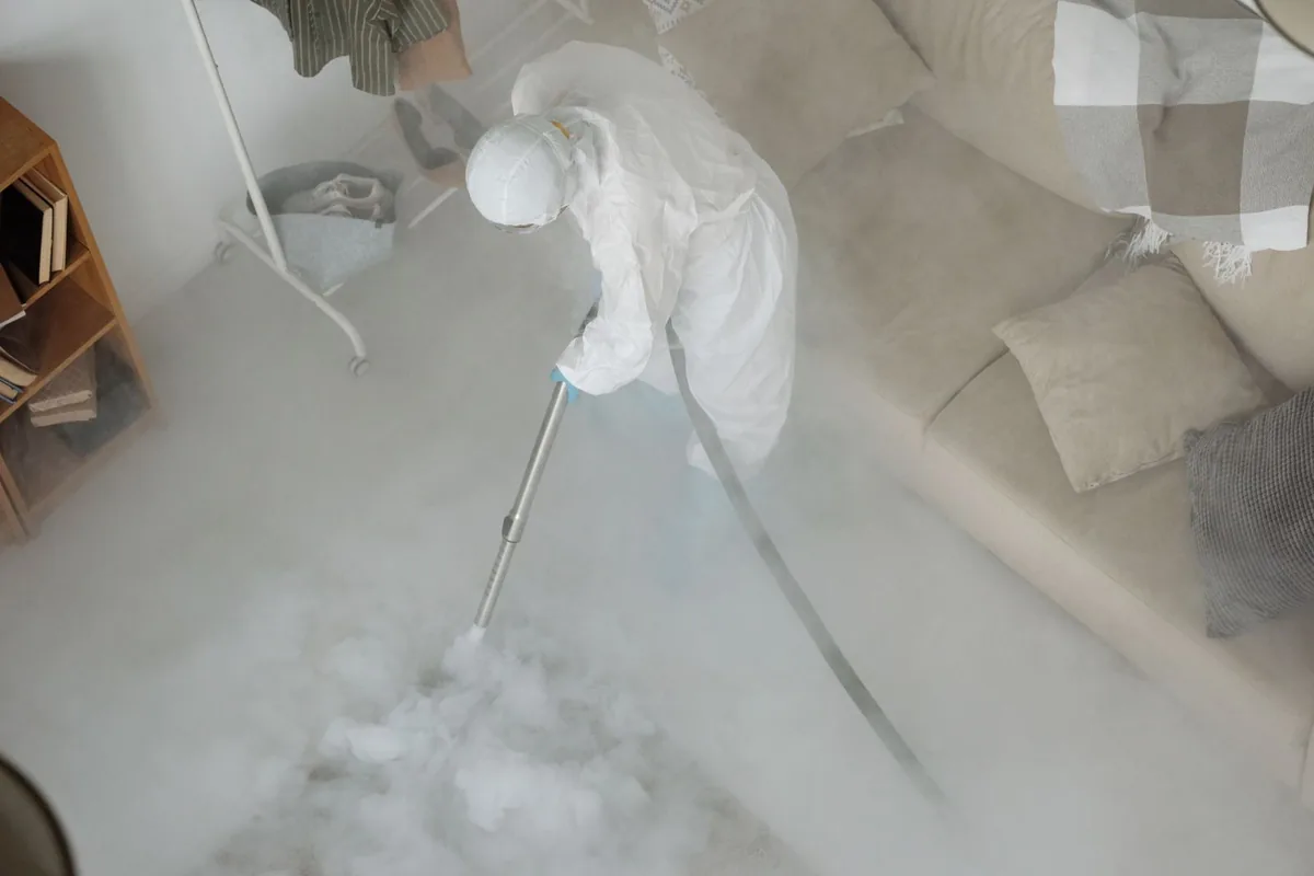 Biohazard cleanup technician in protective equipment, Whitfield, FL